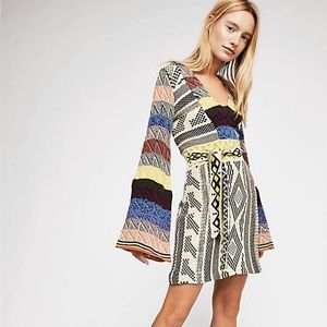 FREE PEOPLE multi-colored sweater dress, size small.